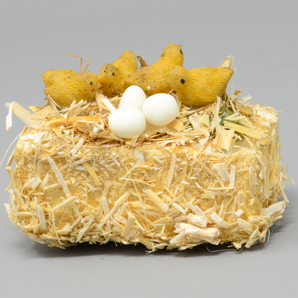 Strohballen mit Küken